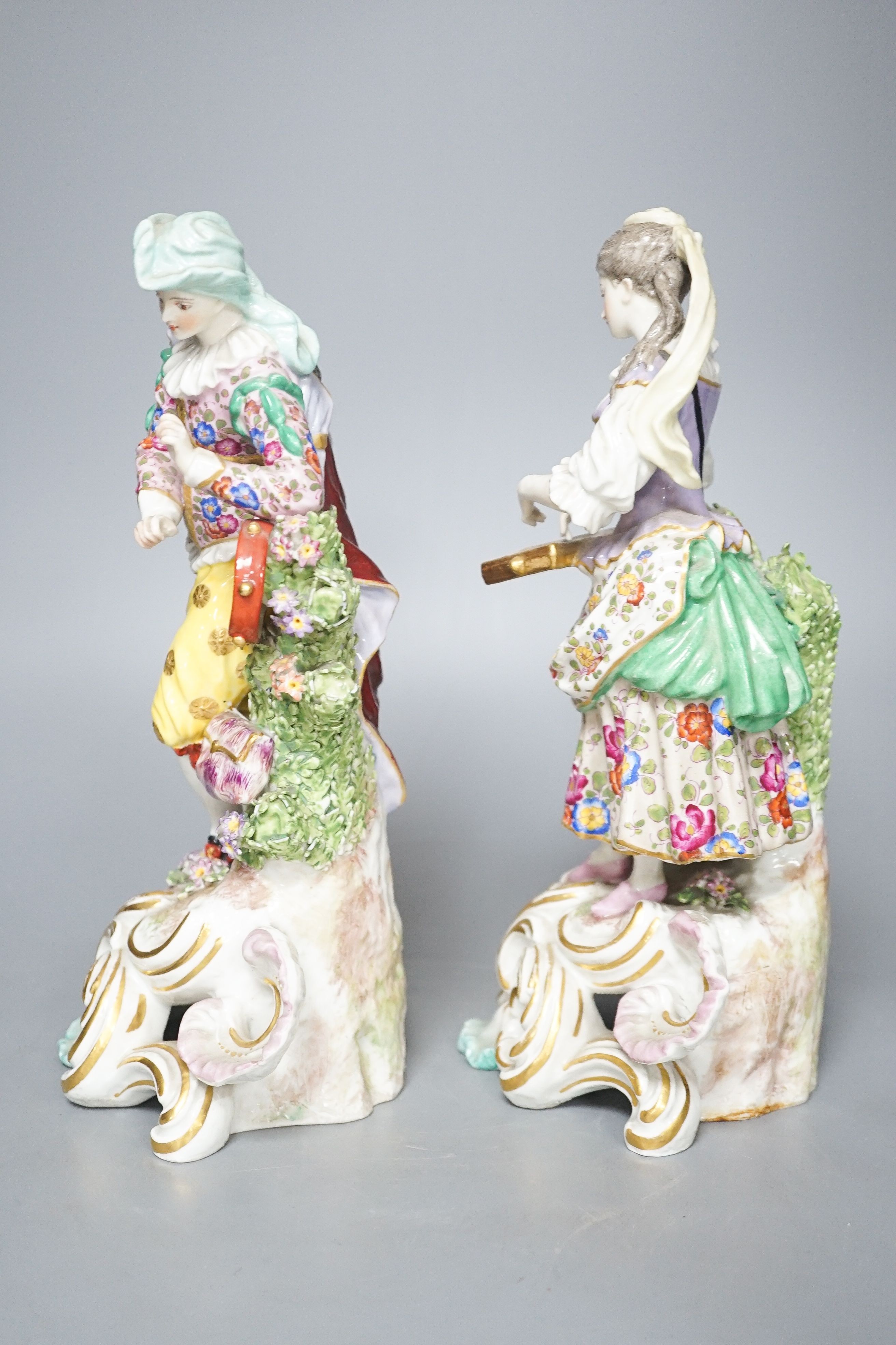Two Continental porcelain figures, a lady and a gent 27cm